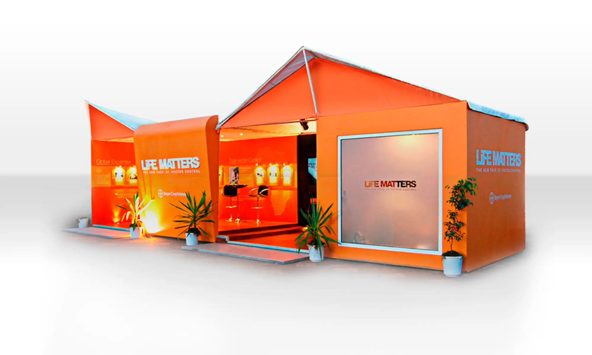 Bayer Life Matters exhibition vibrant orange event booth for Life Matters with modern design and lighting
