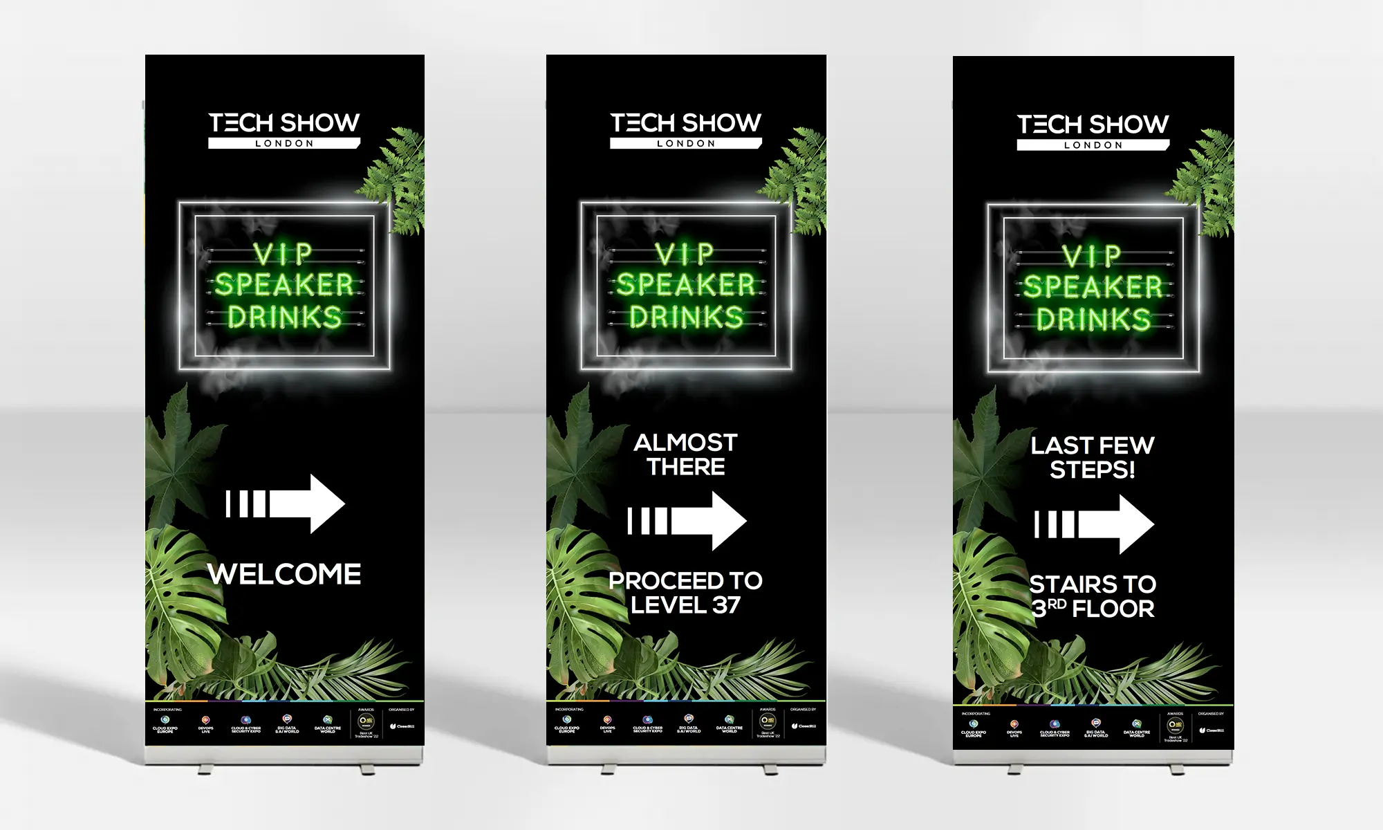 Tech Show Pop-up banners with green plants and neon text directing to VIP speaker drinks event