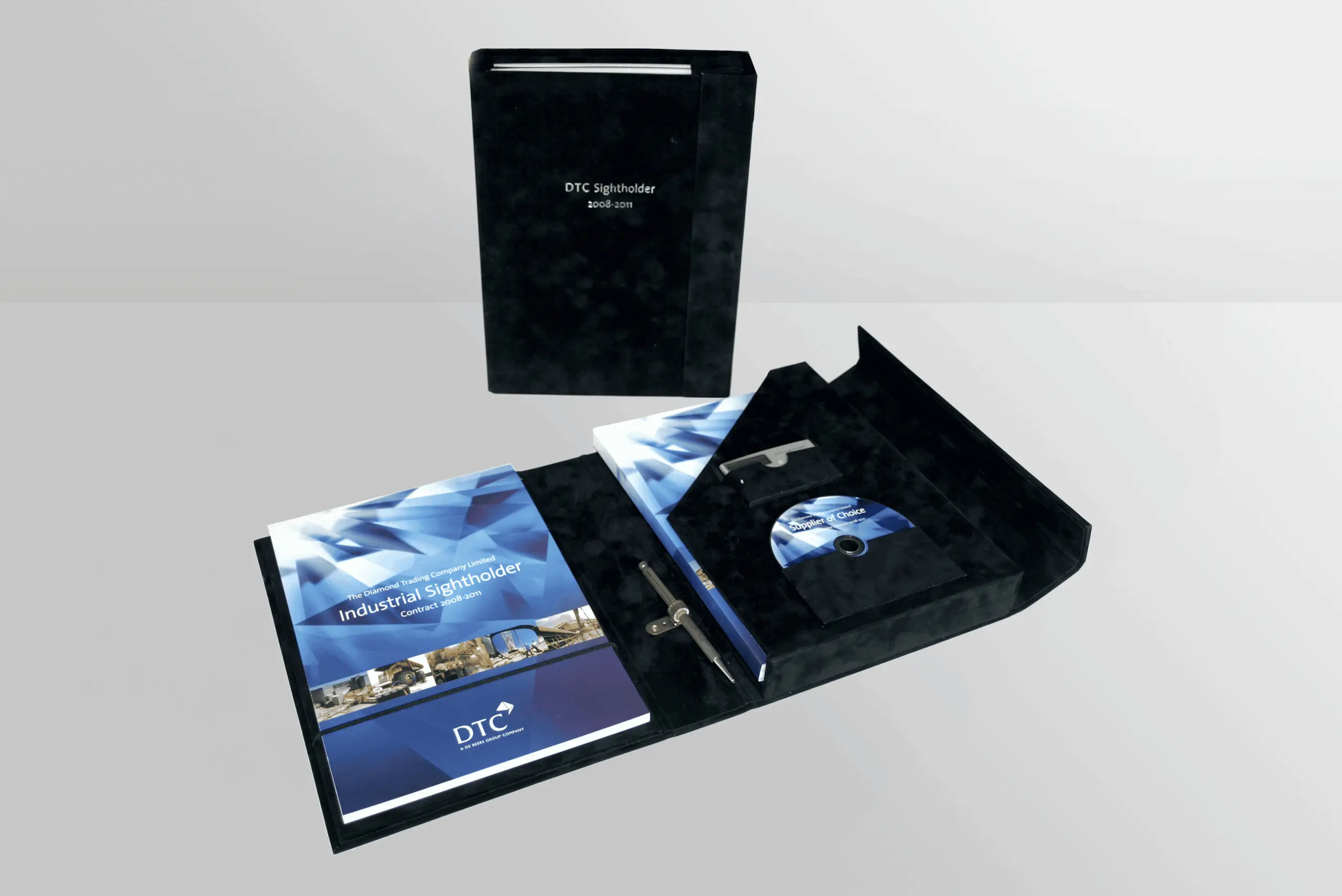 DeBeers welcome pack - professional presentation kit featuring brochures and USB in black branded box