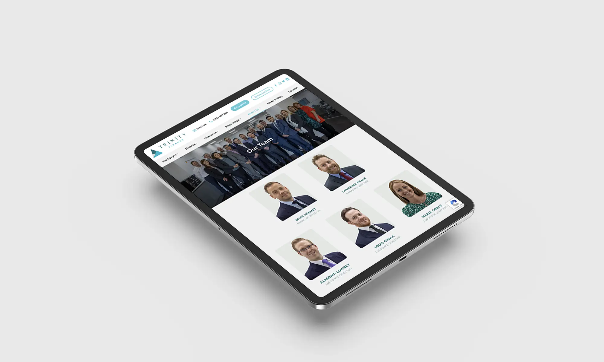 WarmRed Website Redesign Service: showcases a sleek tablet displaying a professional website featuring a team of business individuals and a clean design for modern digital presentation.
